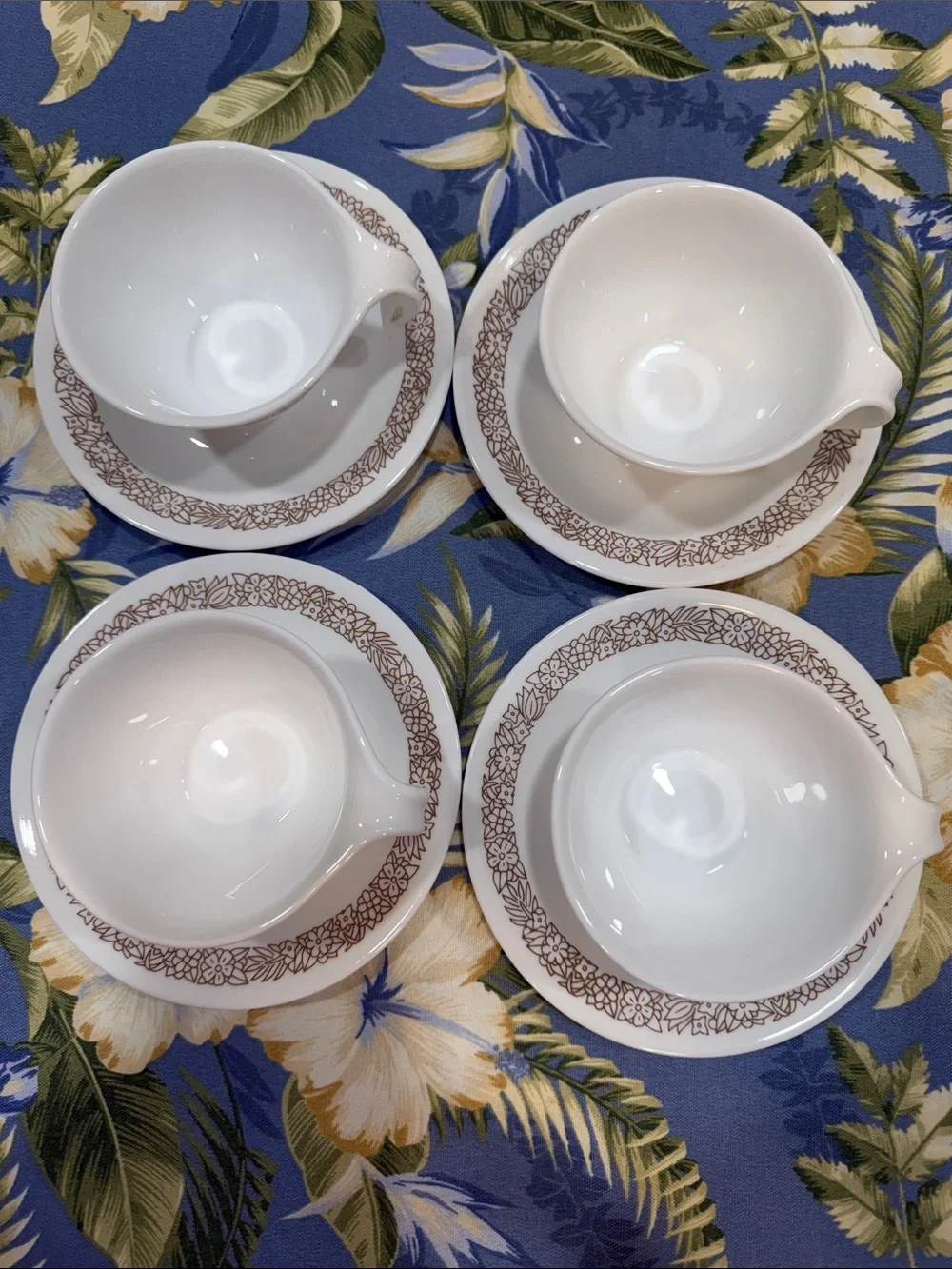Corelle set of four cups and saucers Woodland design.